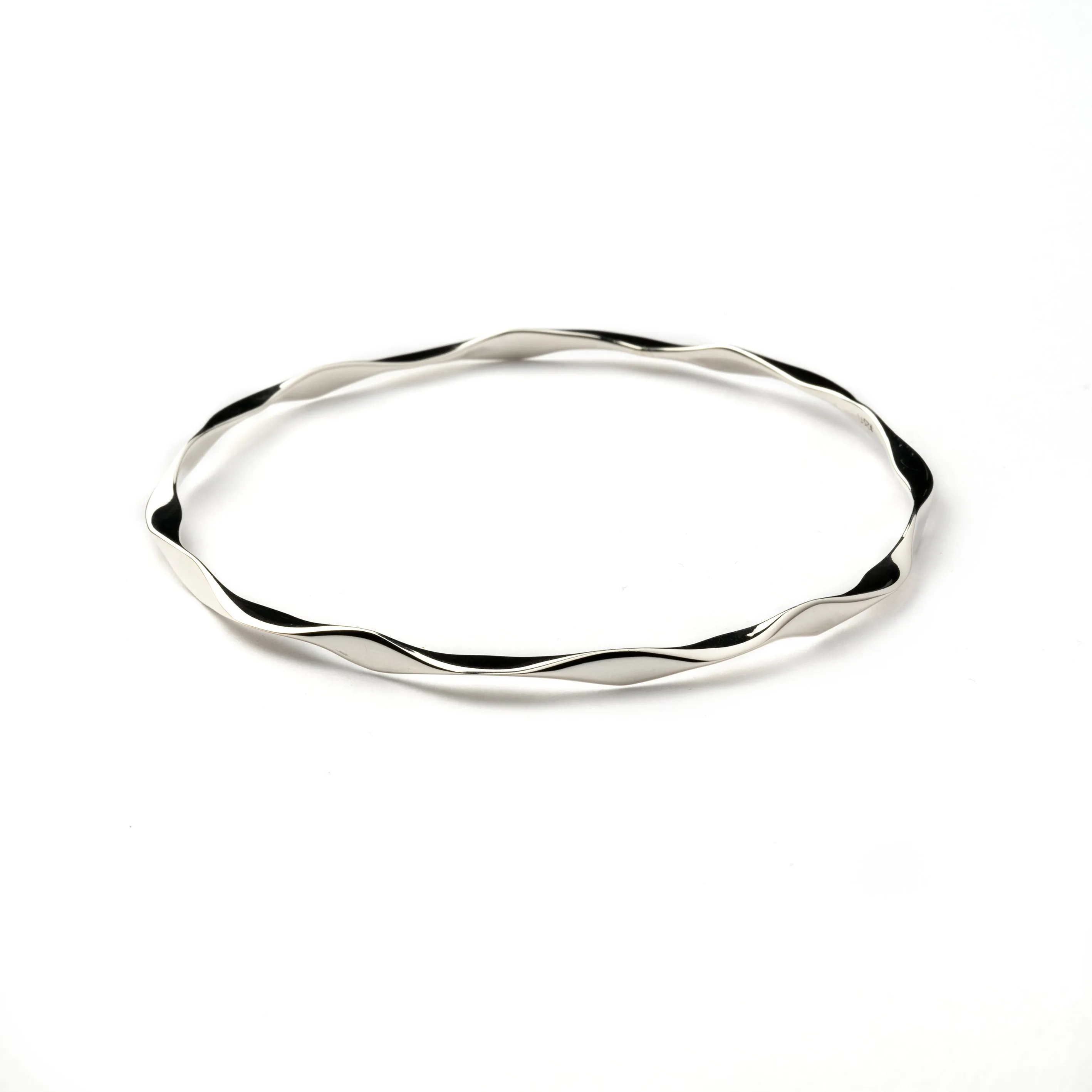 Wave silver bangle